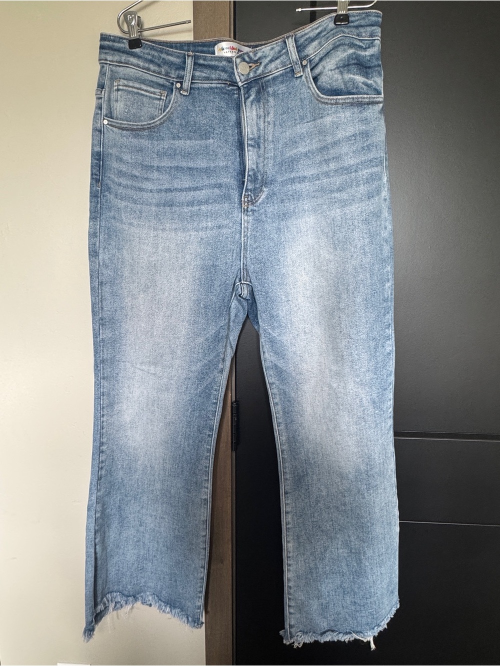 Risen brand Women’s Light Wash Boot-Cut Jeans — Distressed Hem